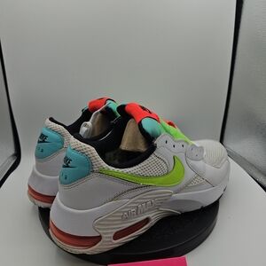 Nike Women’s Athletic Sneakers in White with Neon Green and Aqua Accents